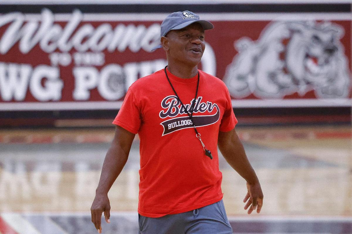Butler girls basketball head coach Mark Sanders jokes with players during practice at Butler High School in Charlotte, N.C., Tuesday, Oct. 25, 2022.