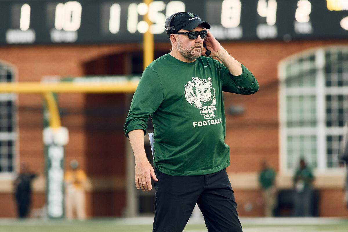 Charlotte 49ers coach Tim Albin looks to regroup in the second half as the 49ers lose 49-14 against the Temple Owls at Jerry Richardson Stadium for Homecoming.