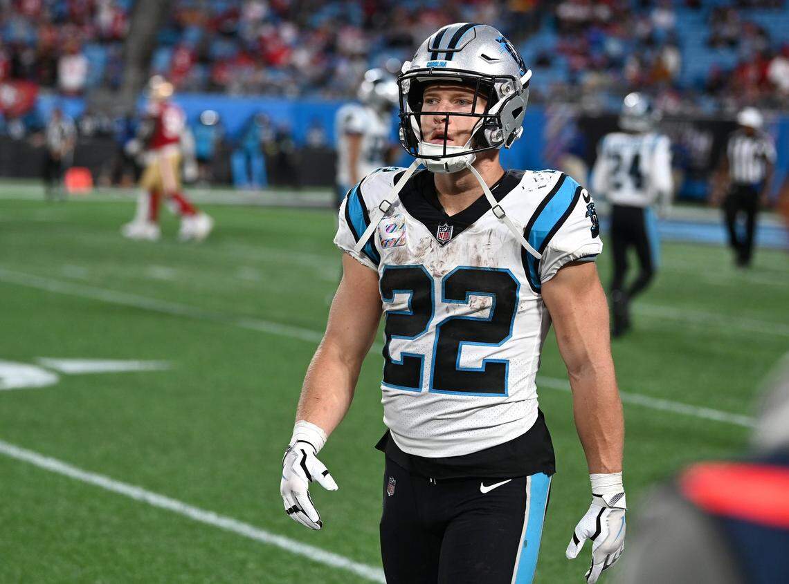 Carolina Panthers running back Christian McCaffrey walks off the field after a series against the San Francisco 49ers in fourth quarter action at Bank of America Stadium on Sunday, October 9, 2022. The 49ers defeated the Panthers 37-15; McCaffrey was traded to San Francisco later that month.