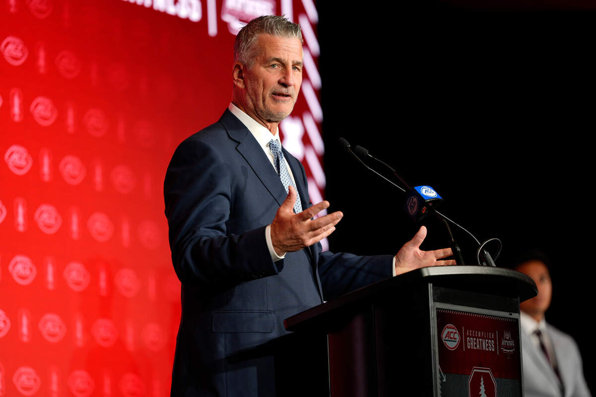 Stanford head coach Frank Reich answers questions from the media during ACC Media Days at Hilton Charlotte Uptown.
