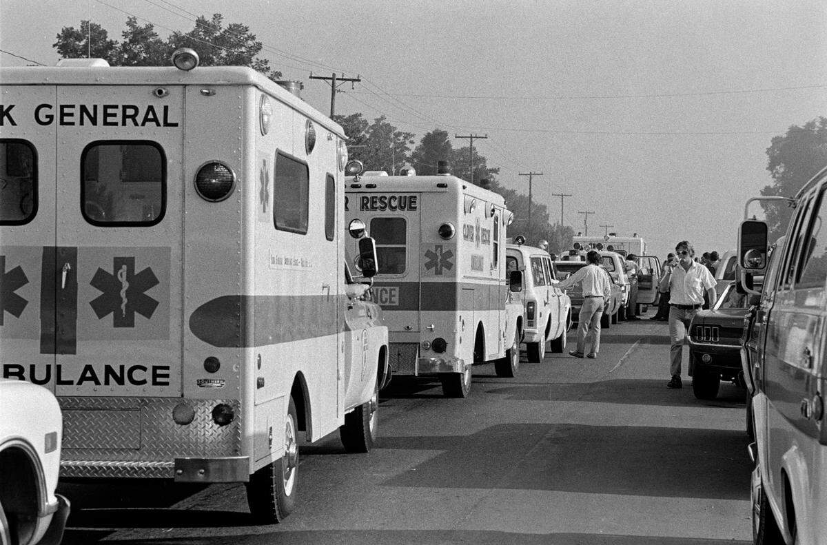 Ambulances line up on Highway 49, ready to carry injured crash survivors of Eastern Air Lines Flight 212 off to local hospitals.