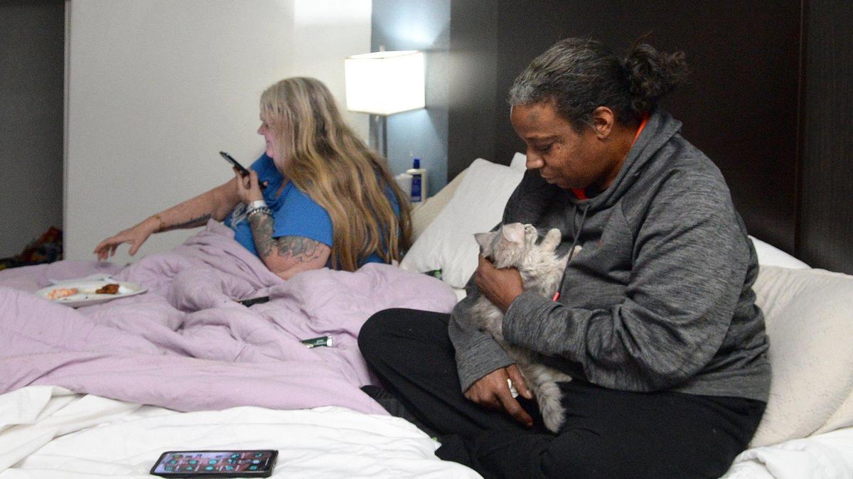 Some former Lamplighter Inn residents, like Ellen Miller (left), 58, and her wife, Eveco Haggins, 53, say they were unsheltered and sleeping in their car a month after the city of Charlotte closed down the hotel.