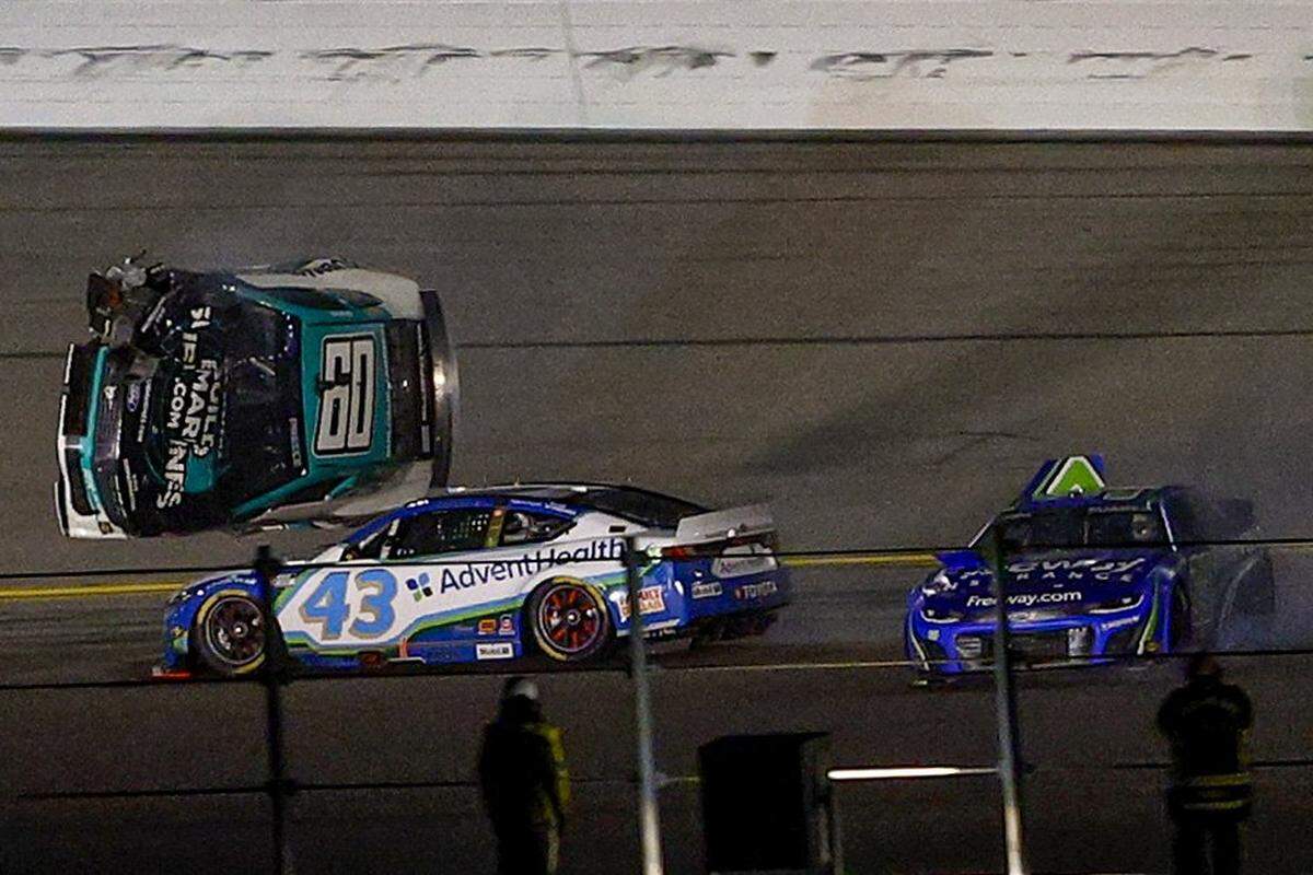 DAYTONA BEACH, FLORIDA - FEBRUARY 16: Ryan Preece, driver of the #60 BuildSubmarines.com Ford flips after an on-track incident during the NASCAR Cup Series Daytona 500 at Daytona International Speedway on February 16, 2025 in Daytona Beach, Florida. (Photo by Mike Ehrmann/Getty Images)