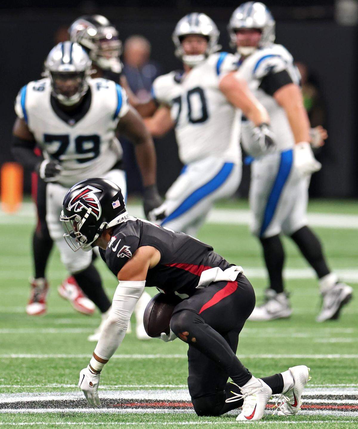Atlanta Falcons safety Jessie Bates III intercepts a pass by Carolina Panthers quarterback Bryce Young during third-quarter action at Mercedes-Benz Stadium in Atlanta, GA on Sunday, September 10, 2023. The Falcons defeated the Panthers 24-10.