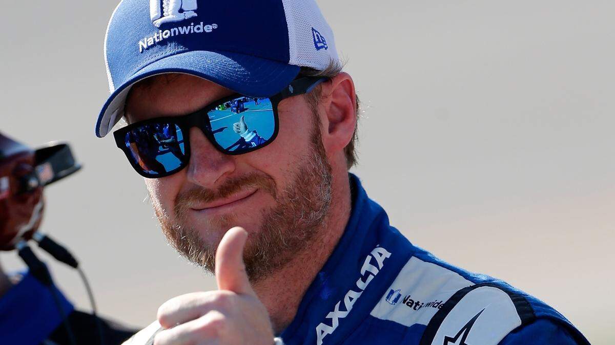 TALLADEGA, AL - MAY 06: Dale Earnhardt Jr., driver of the #88 Nationwide Chevrolet, stands on the grid during qualifying for the Monster Energy NASCAR Cup Series GEICO 500 at Talladega Superspeedway on May 6, 2017 in Talladega, Alabama. (Photo by Brian Lawdermilk/Getty Images)