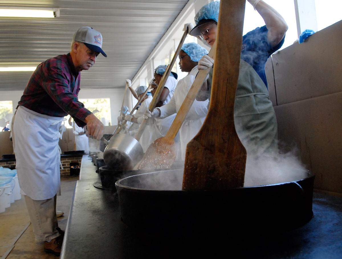 Volunteers work the Brunswick stew at Mallard Creek BBQ in Charlotte in 2008