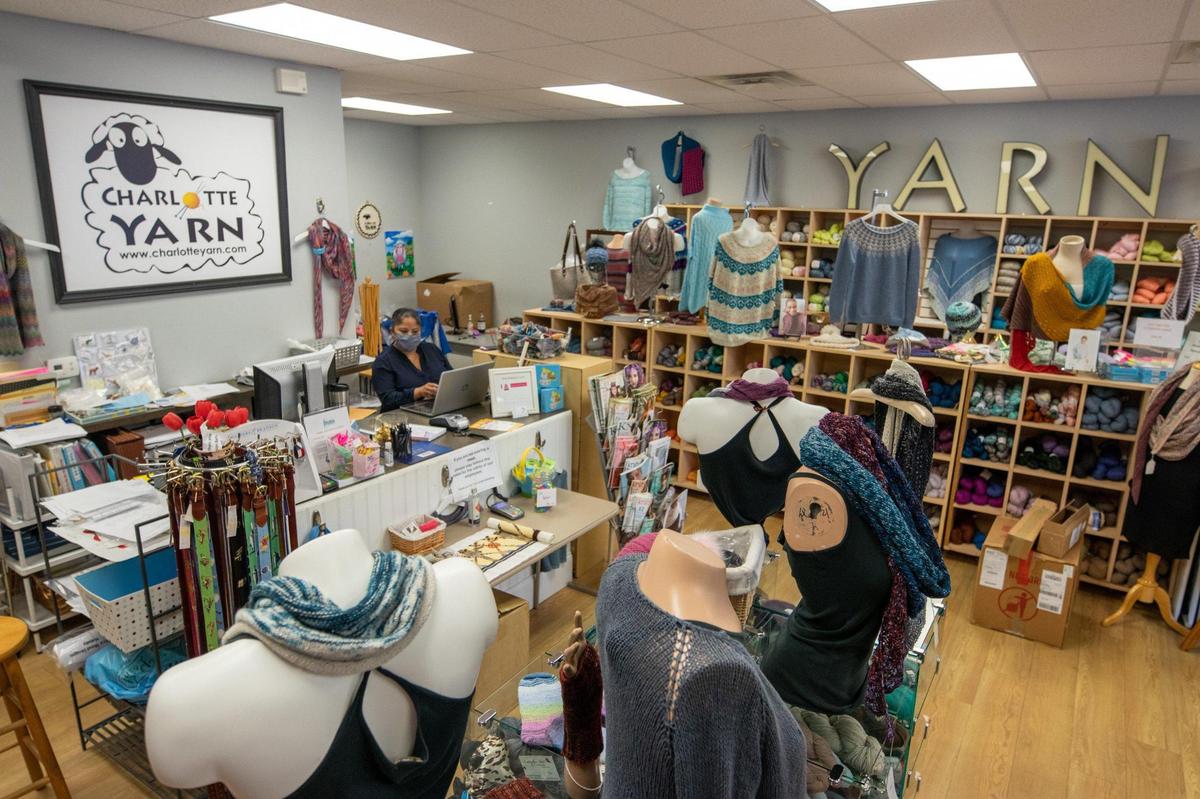 Charlotte Yarn in Dilworth has an array of knitted goods including scarves, sweaters, belts, cowls and hats.
