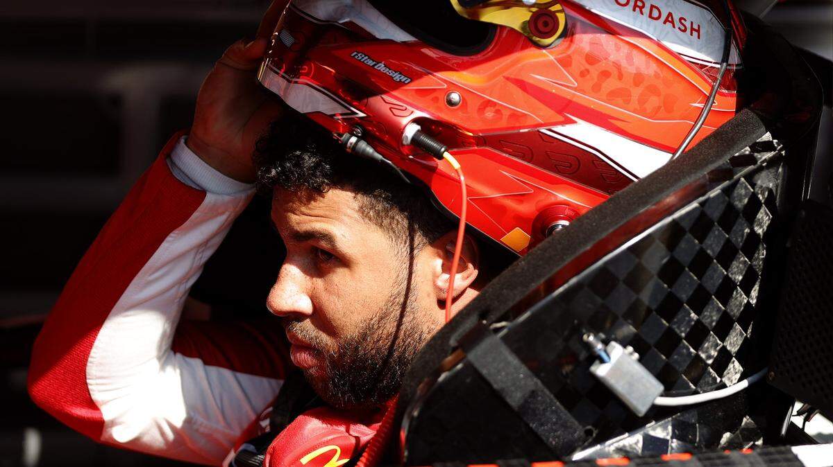 DAYTONA BEACH, FLORIDA - FEBRUARY 10: Bubba Wallace, driver of the #23 Door Dash Toyota, sits in his car in the garage area during practice for the NASCAR Cup Series 63rd Annual Daytona 500 at Daytona International Speedway on February 10, 2021 in Daytona Beach, Florida. (Photo by Chris Graythen/Getty Images)