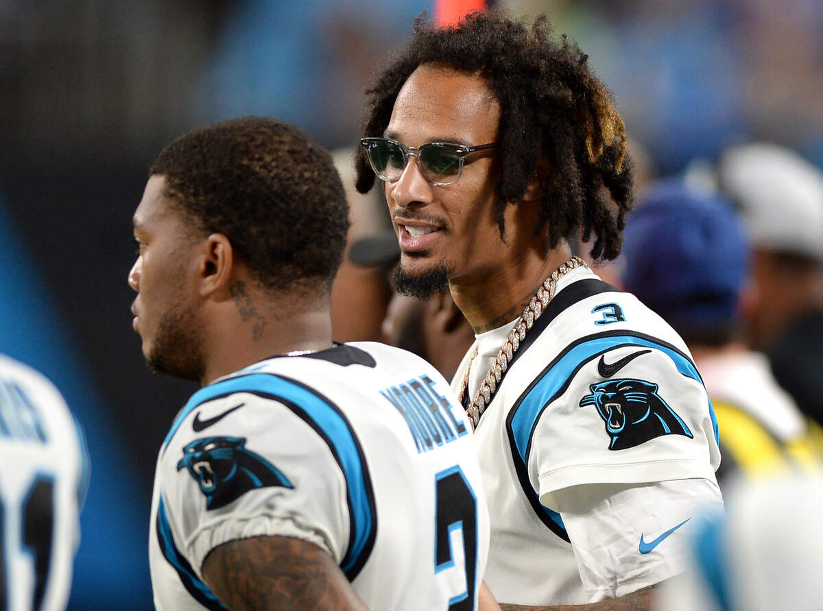 Carolina Panthers wide receivers DJ Moore, left and Robbie Anderson, right, stand along the team’s sideline during action against the Buffalo Bills at Bank of America Stadium in Charlotte, NC on Friday, August 26, 2022.