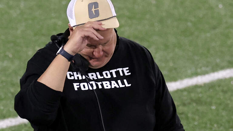 Grading the Charlotte 49ers: Is head coach Biff Poggi’s seat heating up? He thinks so
