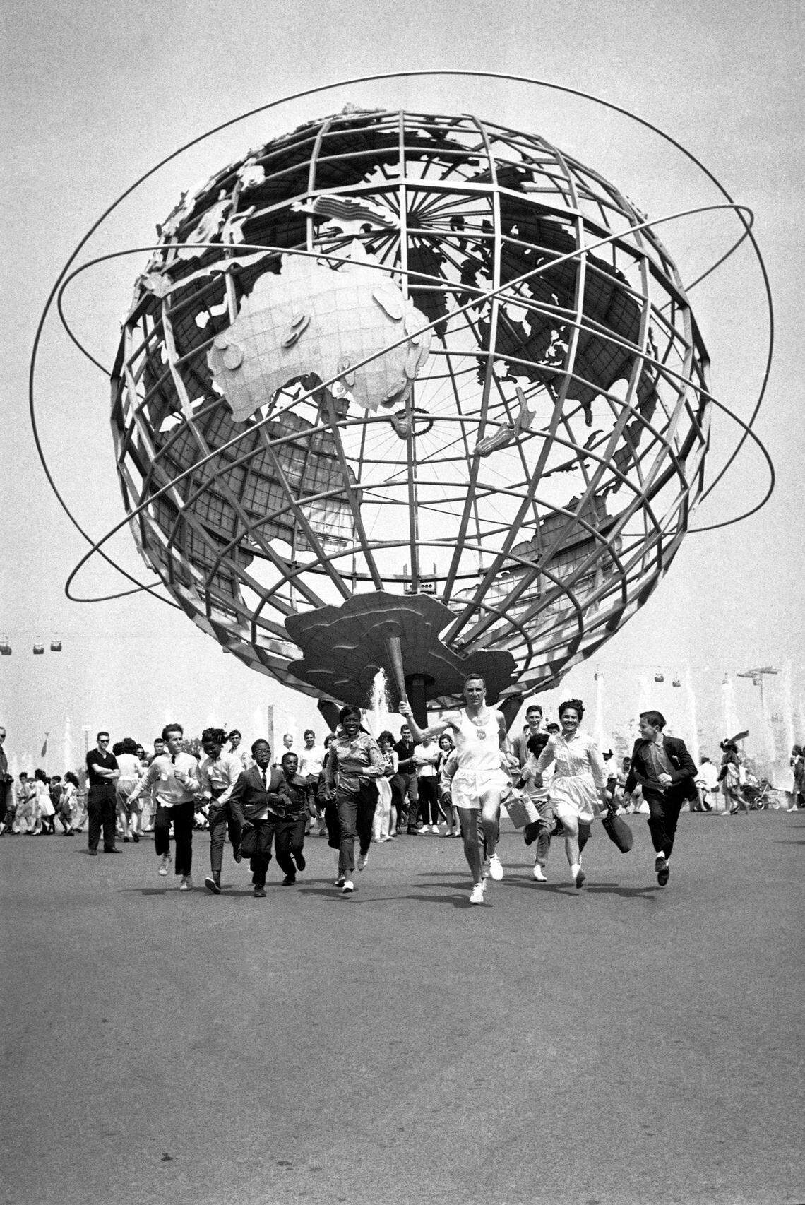Some of the hoopla near the Unisphere at the New York World’s Fair in 1964. A movie about world’s fairs will be shown at the Bechtler Museum of Modern Art in November.