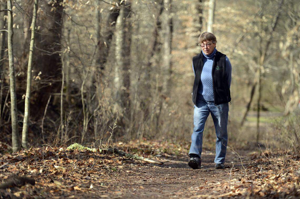 Anne Springs Close, the matriarch of the Springs family in South Carolina, died Friday at age 95. In this file photo, Close was 87 while walking the greenway named for her.