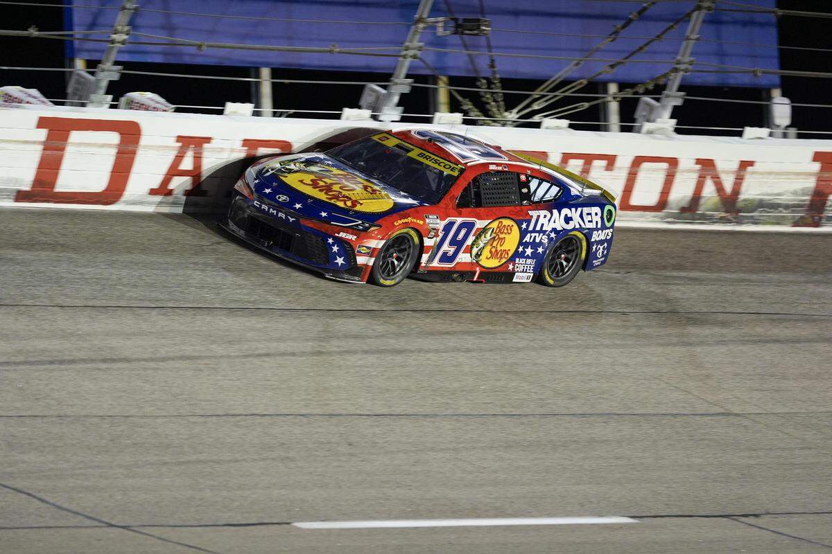 Aug 31, 2025; Darlington, South Carolina, USA; NASCAR Cup Series driver Chase Briscoe (19) drives out of turn one during the Cook Out Southern 500 at Darlington Raceway.