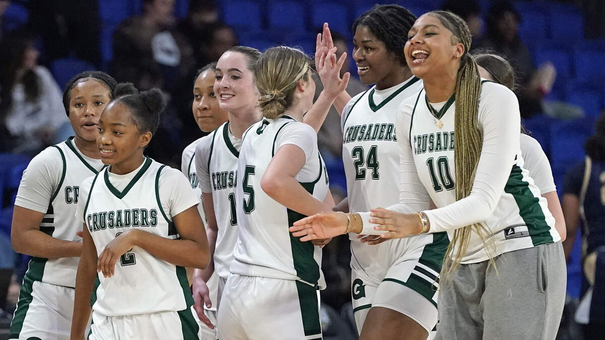 Grace Christian's players celebrate after winning the N.C. Independent Schools Athletic Association's 3A women's basketball championship game over Concord Academy on Friday, Feb. 27, 2026, in Greensboro, N.C. (Credit: Bill Kiser/Special to the Charlotte Observer)