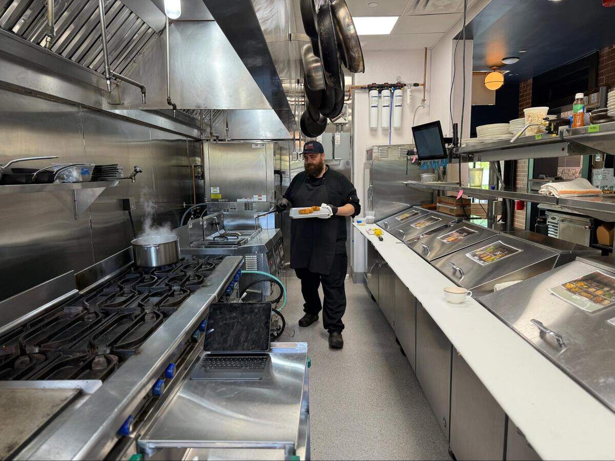 Leluia Hall executive chef Chris Rogienski makes the restaurant’s luxe Fish Sticks, which come out hunky, crisp and ready to dip in the house-made tartar sauce.