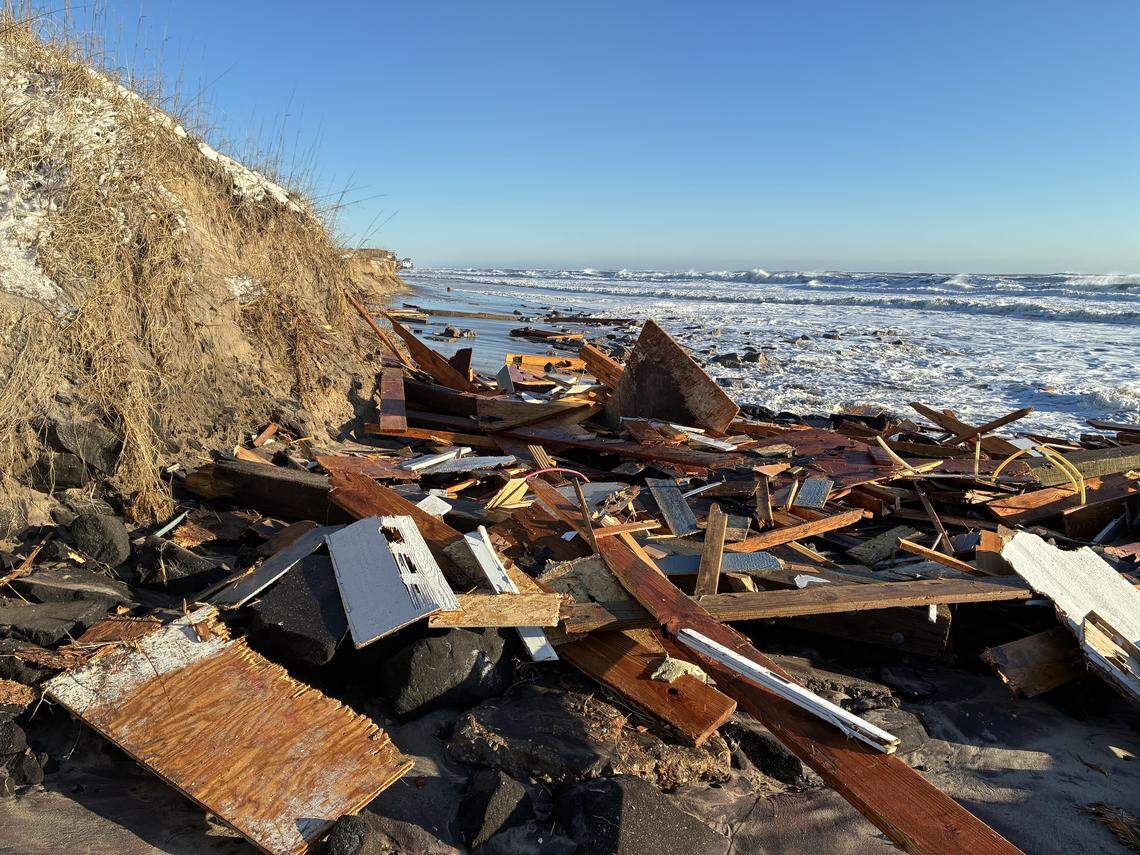 Debris from the collapsed homes is collecting on beaches, posing a threat to tourists in the Buxton area, officials say.