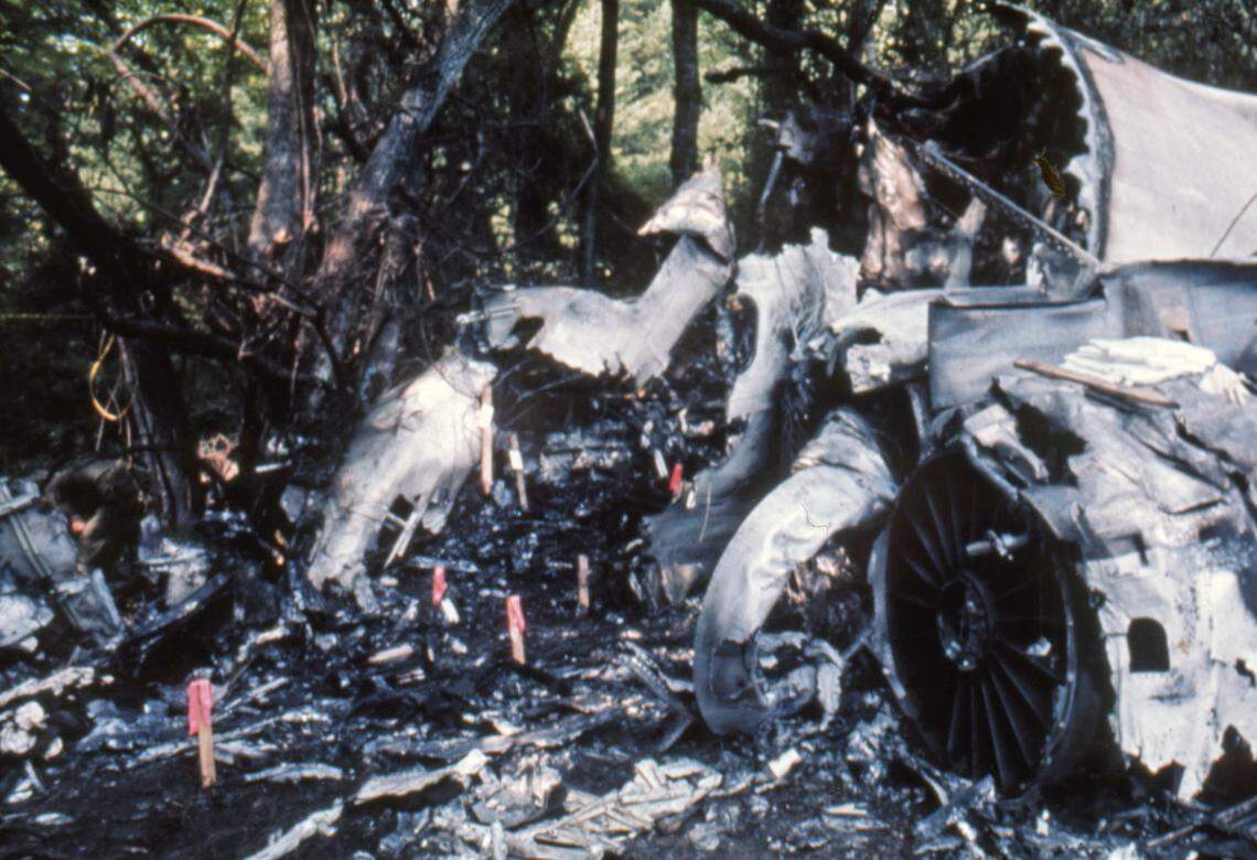 Wooden stakes were placed amid the wreckage after Flight 212 crashed on Sept. 11, 1974, in Charlotte. Each stake represented where the body of a deceased passenger had been recovered by rescue crews. Of the 82 people on board the Eastern flight, 72 died and 10 survived.