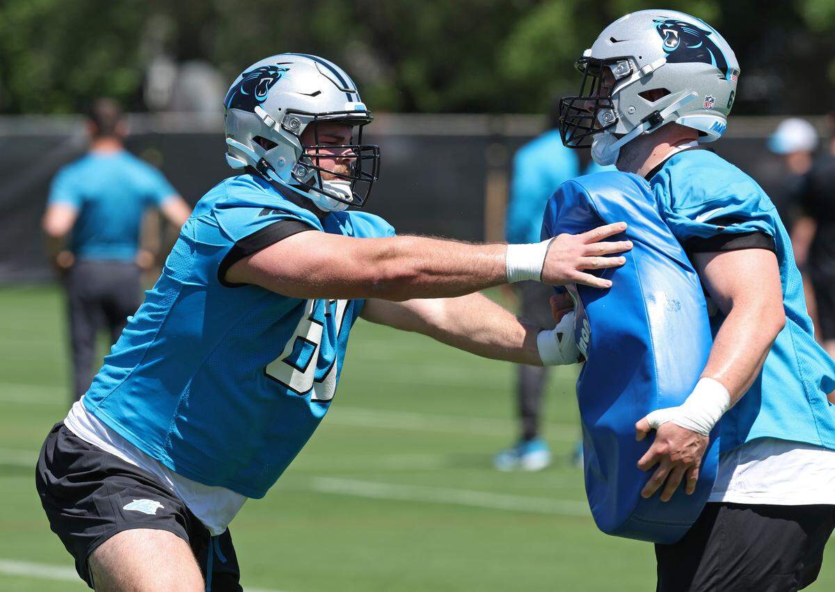 Carolina Panthers lineman Luke Kandra, left and lineman Steven Losoya run through drills during the team’s rookie minicamp practice on Friday, May 9, 2025.