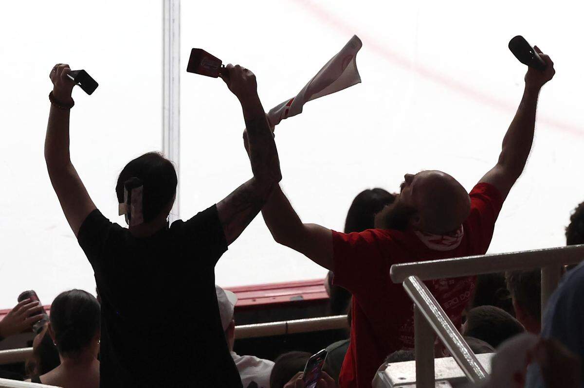 Charlotte Checkers fans look to provide support to the team by ringing cowbells during the team’s game against Abbotsford Canucks in Monday’s Game 6 of the Calder Cup Finals at Bojangles Coliseum. The Canucks defeated the Checkers 3-2 to win the Calder Cup.
