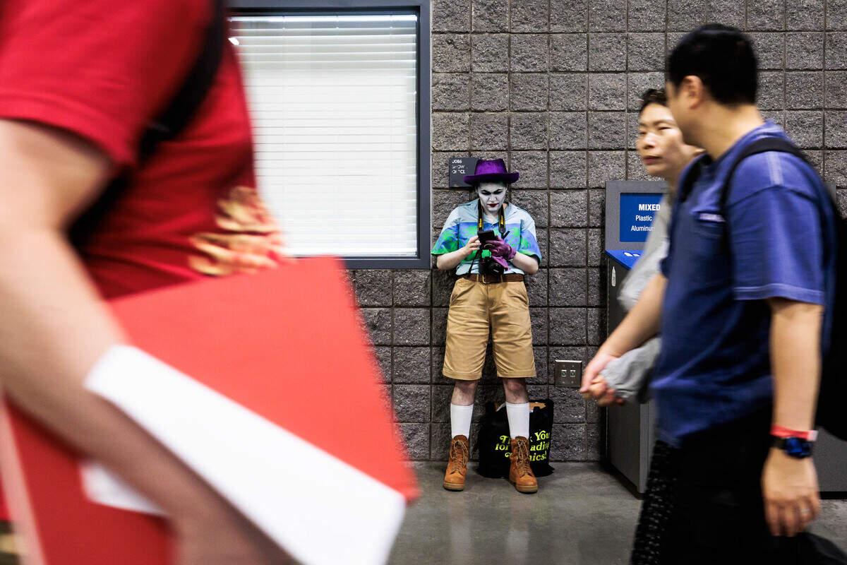 Martin Nolan cosplays the Joker from the graphic novel “Batman: The Killing Joke” at Heroes Convention on Friday, June 12, 2026 at the Charlotte Convention Center. “This is my real hair,” Nolan said referring to the green dye. “I’m the Joker every day.”