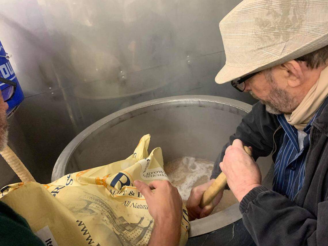 Jess Faucette brews a batch of beer at Belmont Brewing Co. The brewery opens March 6. 