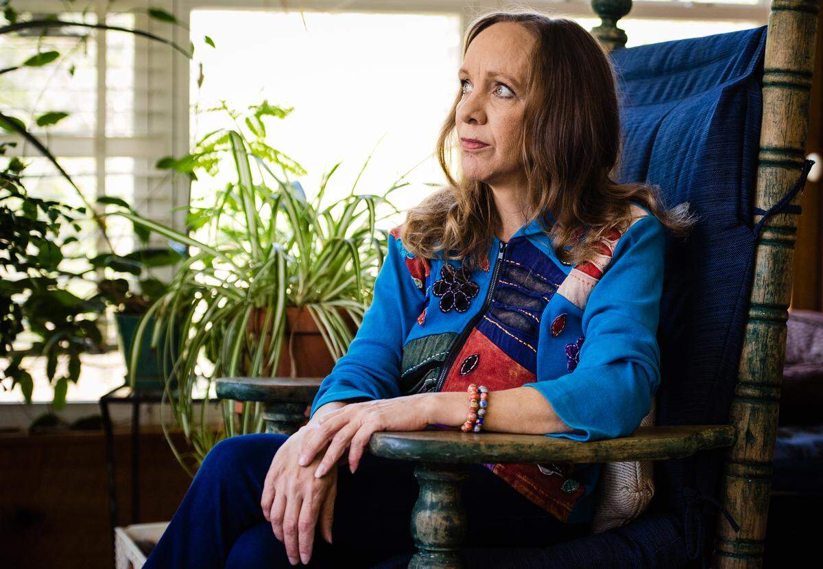 Julia Harris, pictured at her home near Brevard, N.C., said she was struck with one thought when she arrived at Recovery Connections last year for help with an alcohol problem: “I have landed in an insane asylum.”
