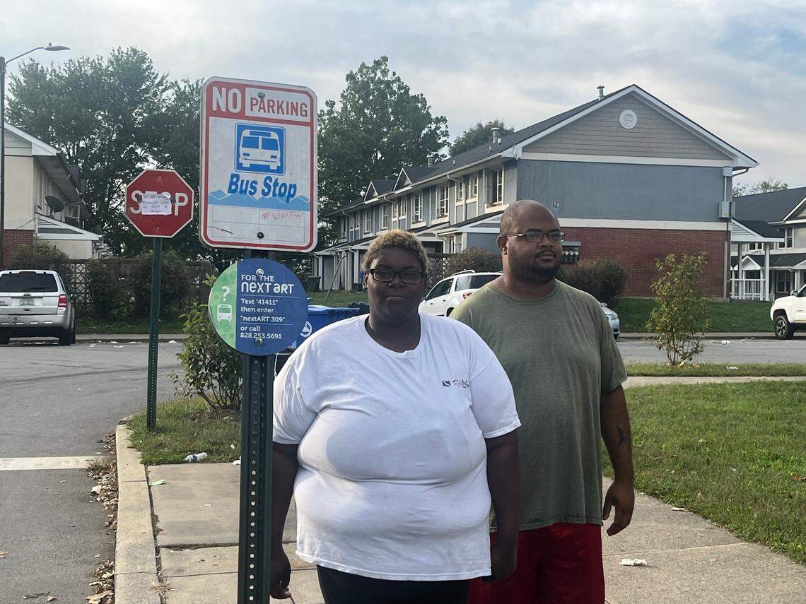Kyesha Nelson, standing Friday in Asheville with TJ Wilson, said Helene has made it especially difficult to get the special milk her 6-month-old baby needs.
