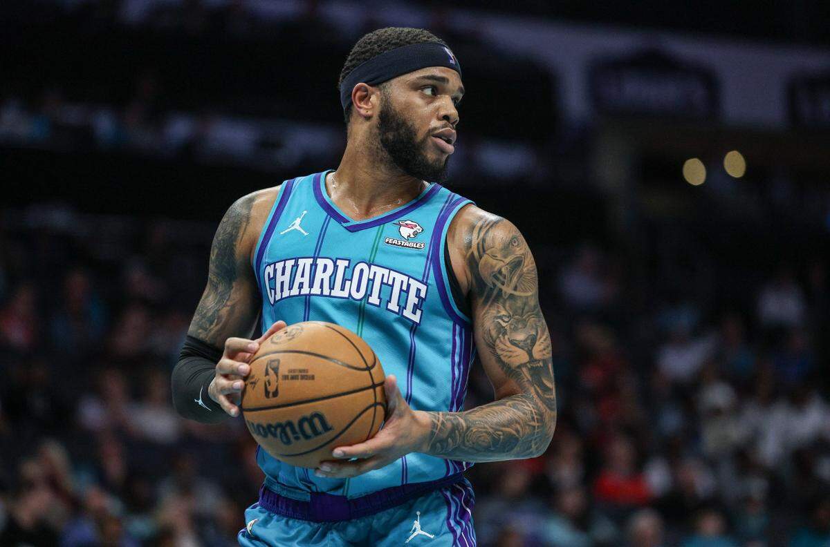 Hornets forward Miles Bridges prepares to inbound the ball during the game against the Rockets at Spectrum Center on Friday, January 26, 2024.