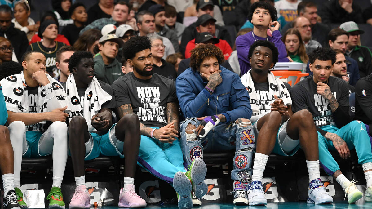 Charlotte Hornets players sit on the bench during late fourth-quarter action against the Boston Celtics at Spectrum Center in Charlotte, NC on Monday, January 16, 2023. The Celtics defeated the Hornets 130-118.