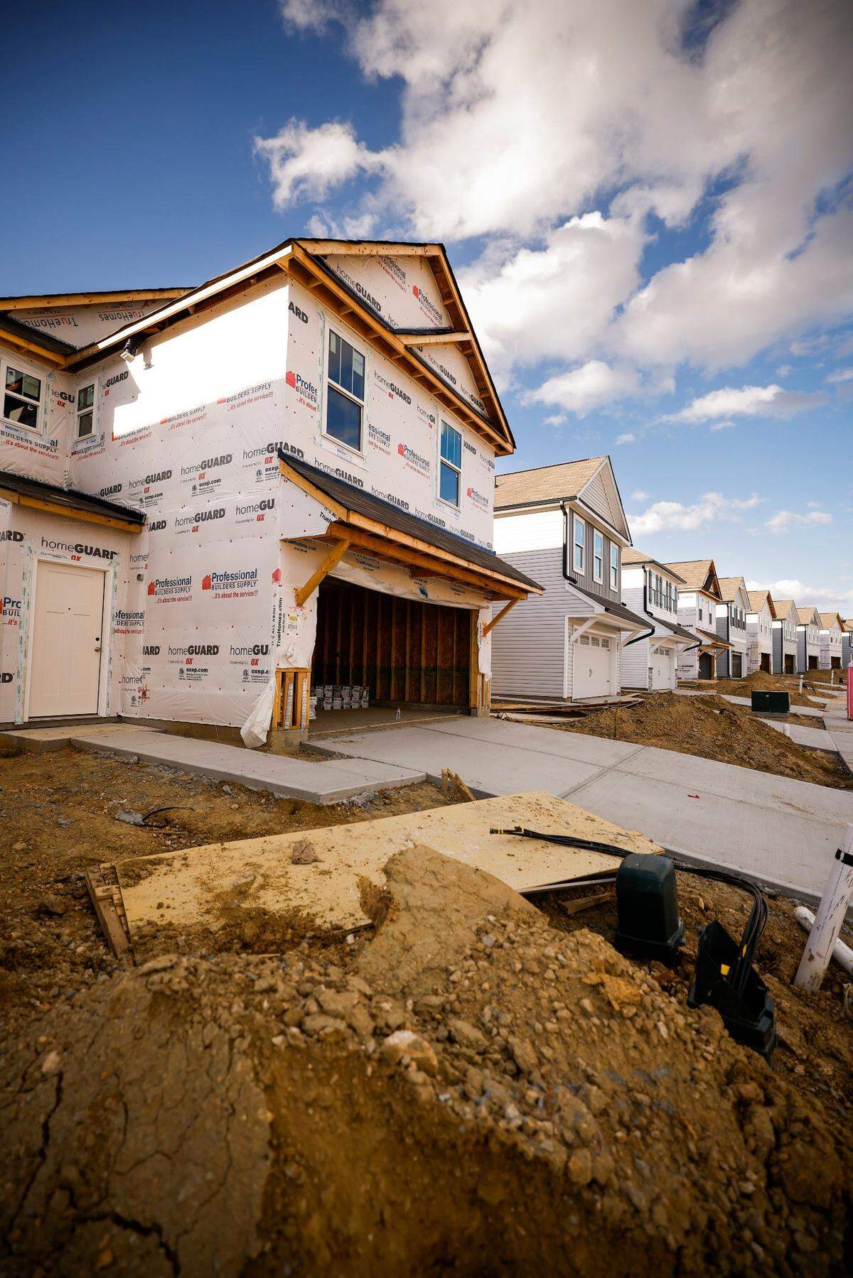 Signal family homes under construction in the Villages at Mallard Creek subdivision in Charlotte, N.C., Friday, Nov. 4, 2022.