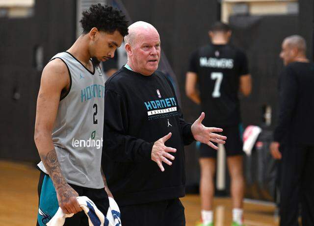 Charlotte Hornets head coach Steve Clifford, right, talks with guard James Bouknight during a September practice. Clifford would like Bouknight to make a significant jump this season.