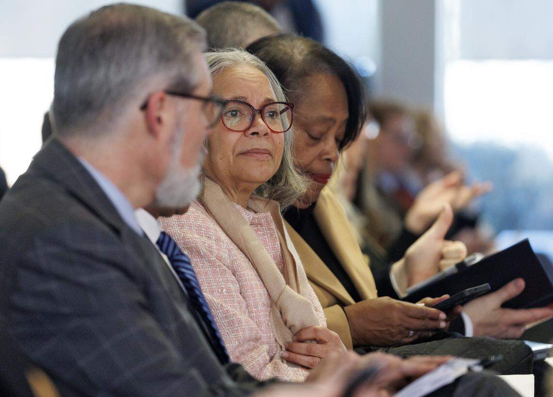 Charlotte Mayor Vi Lyles, second from left, awaits the start of the House Select Committee on Oversight and Reform on Monday, Feb. 9, 2026, at the North Carolina Legislative Building.