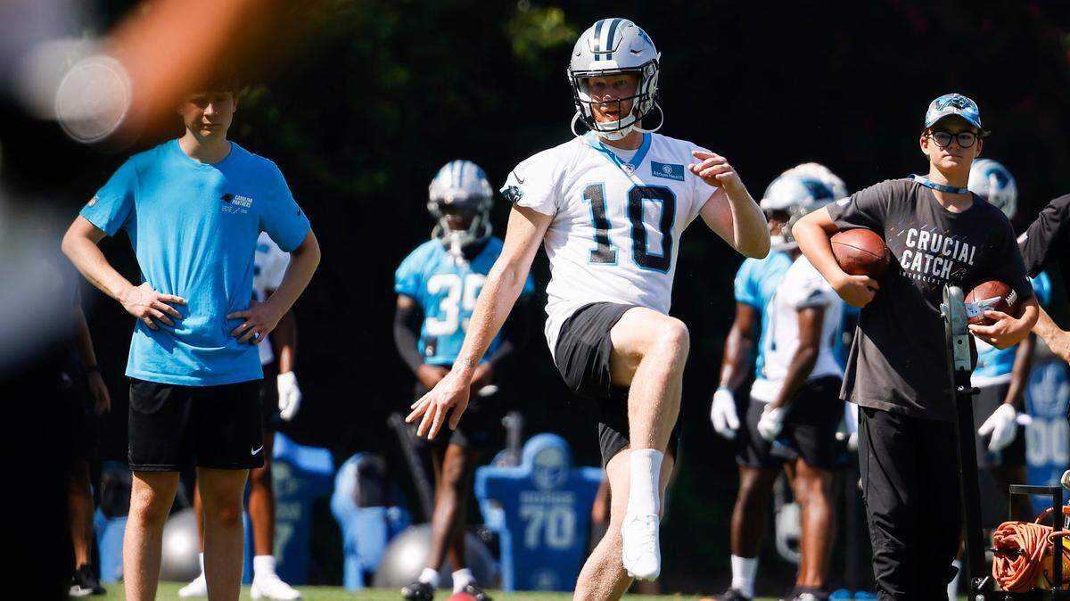Carolina Panthers punter Johnny Hekker (10) runs a drill during the teams training camp practice at Wofford College in Spartanburg, S.C., Thursday, July 28, 2022.