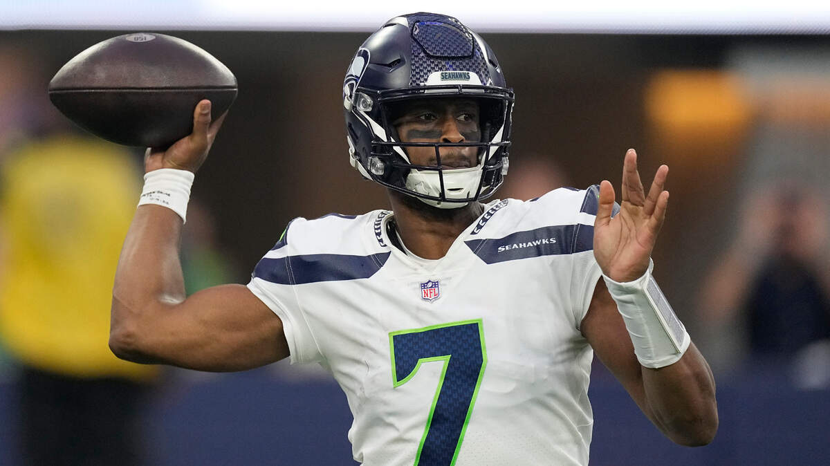 Seattle Seahawks quarterback Geno Smith throws during the second half of an NFL football game against the Los Angeles Rams Sunday, Dec. 4, 2022, in Inglewood, Calif. (AP Photo/Mark J. Terrill)