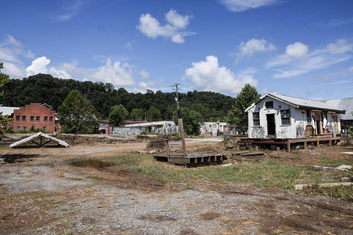 The River Arts District in Asheville sits in ruins after devastating flooding last year from Helene.