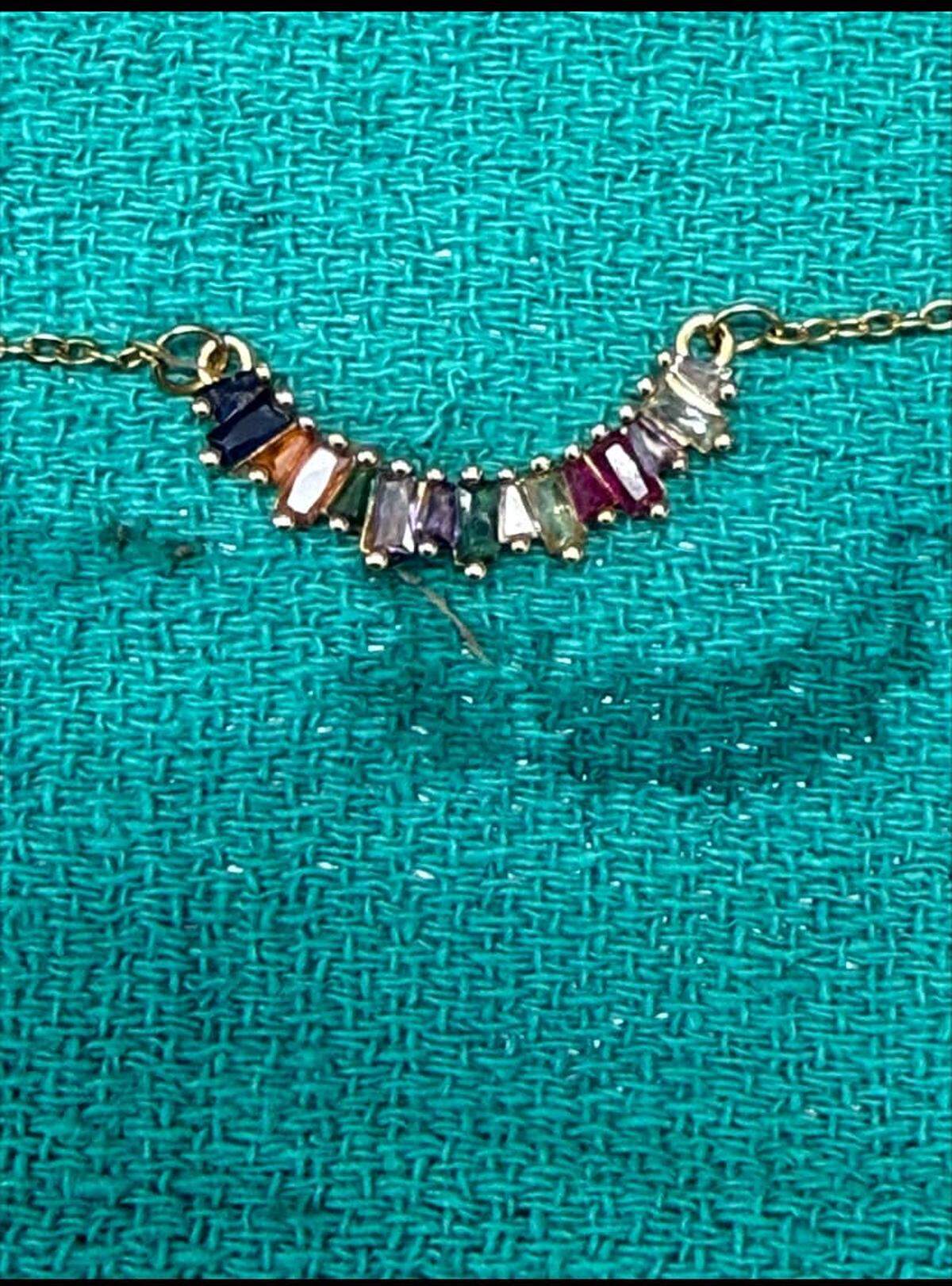 A photo of the necklace the woman was wearing when she was found dead along a highway last week, shared by the Cabarrus County Sheriff’s Office on Tuesday.