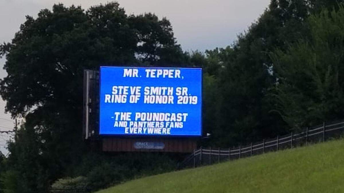 A group of Panthers fans have installed a billboard on Interstate 77 calling on the team to induct former Panther Steve Smith Sr into the team’s Hall of Honor.
