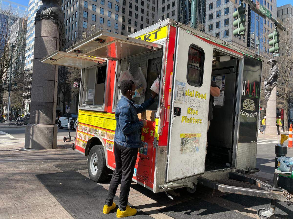 You’ll find the original Halal Food Cart uptown at 101 N. Tryon St.