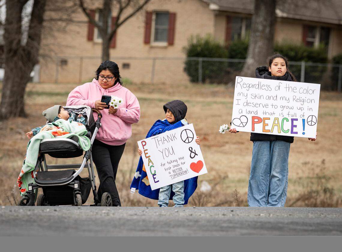 Hundreds gathered near the North Carolina and South Carolina border to see the peace-walking monks during their journey into Charlotte. 