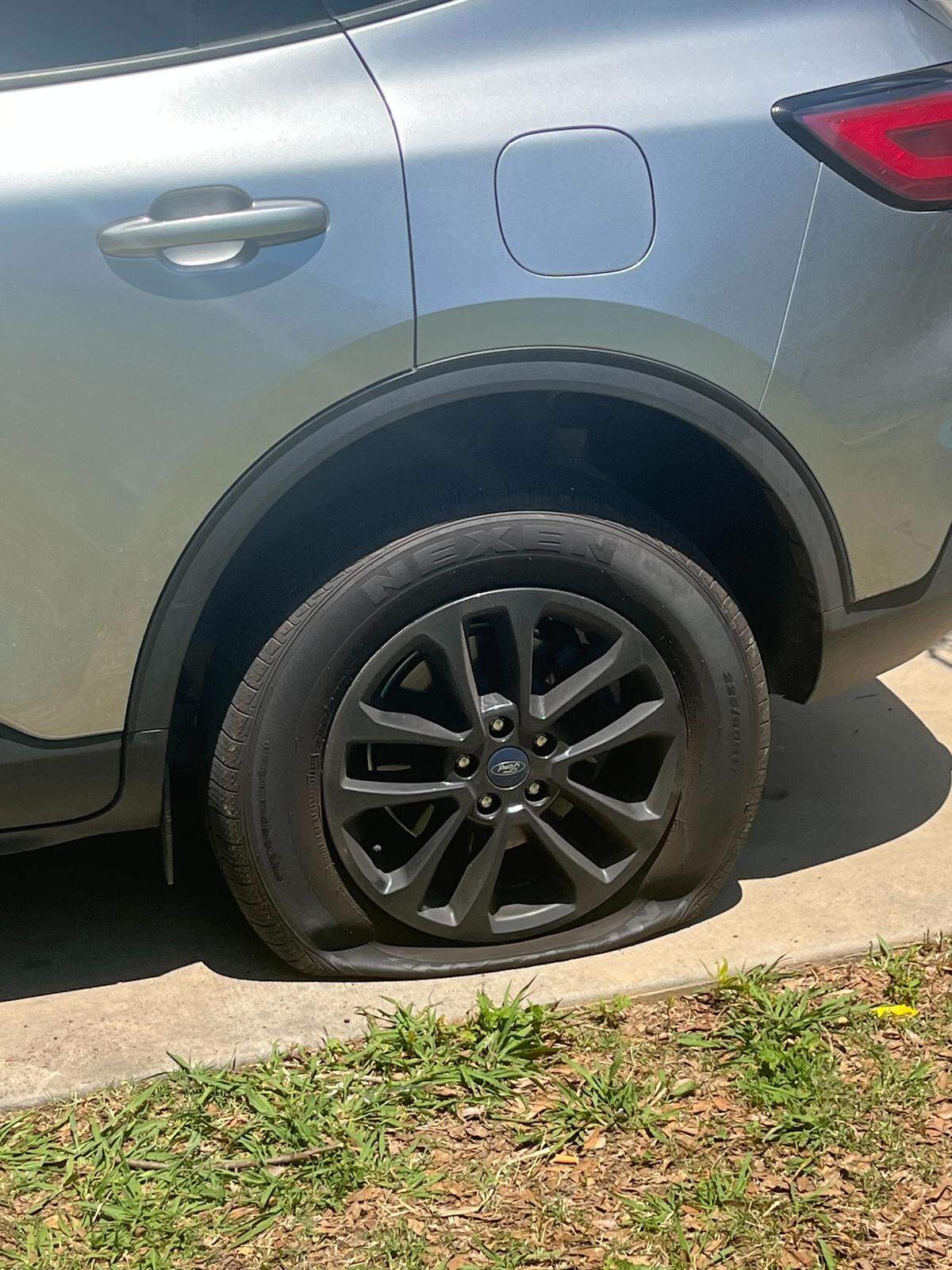 A man who Gastonia police say barricaded himself inside a home Wednesday morning fired rounds at a car across the street.