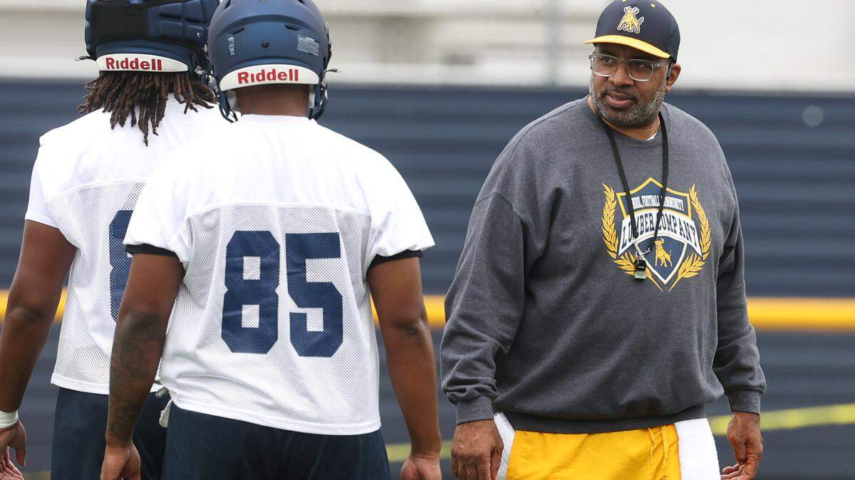 Johnson C. Smith University head football coach Maurice Flowers, right, during practice on Wednesday, August 6, 2025.