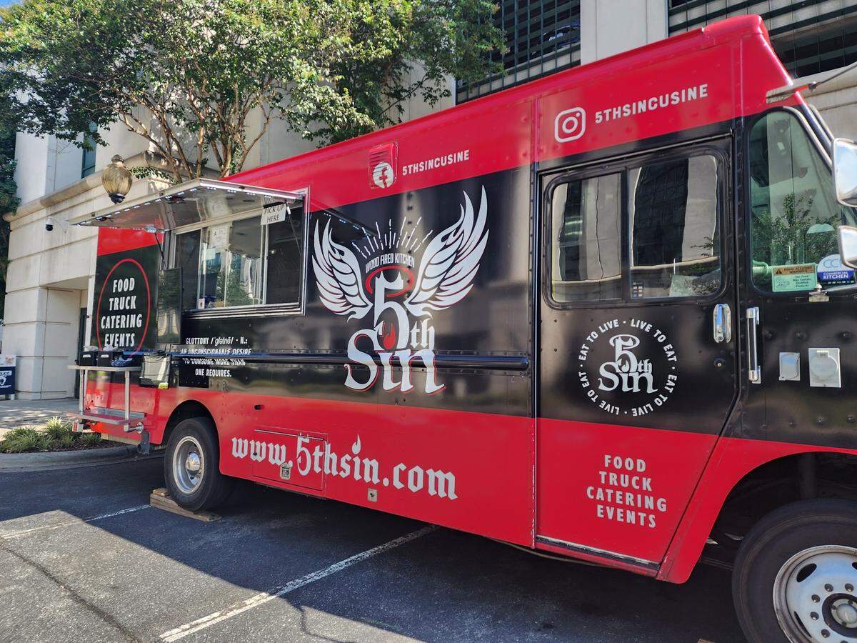 5th Sin Food Truck sells burgers, plus brisket and chicken sandwiches.