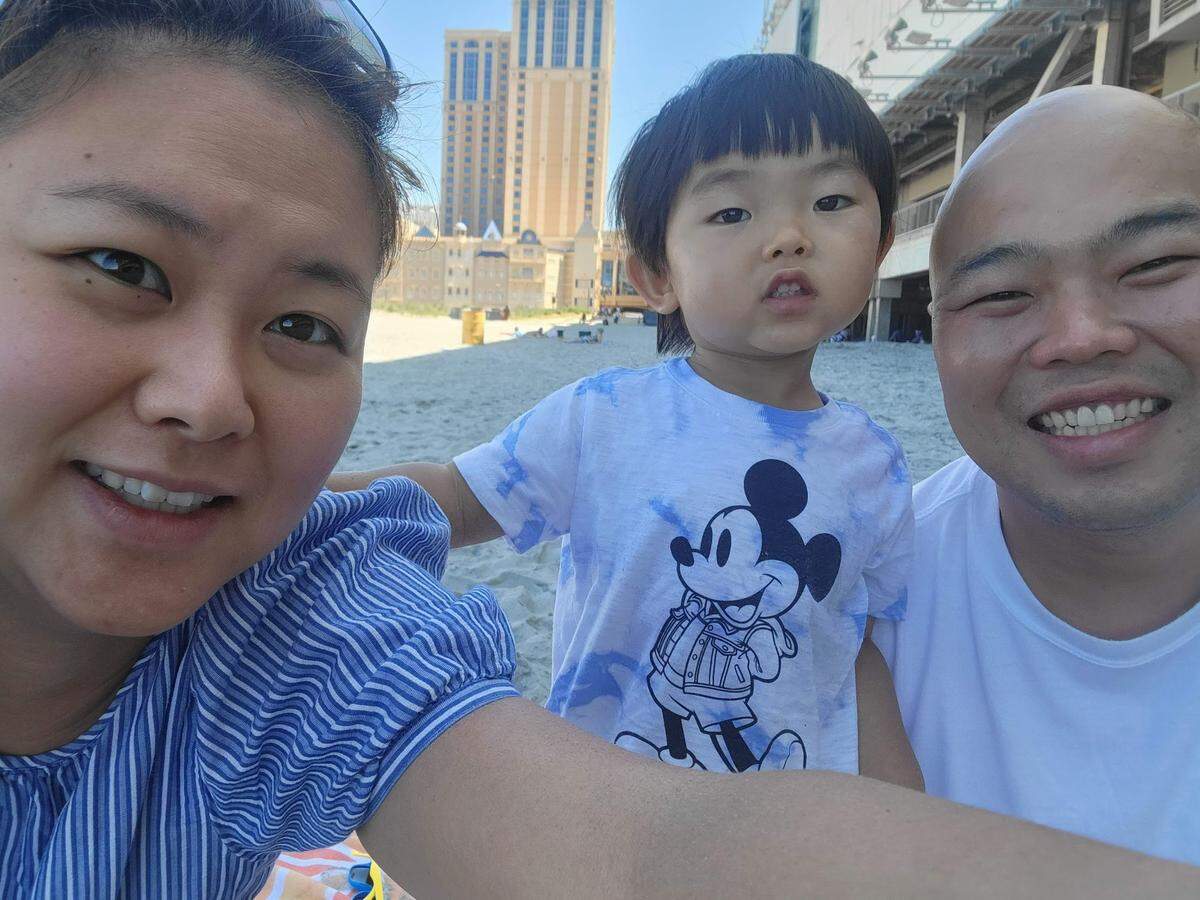 Somi Sushi owners chef Thomas and Julia Seo with their young son, also named Thomas.