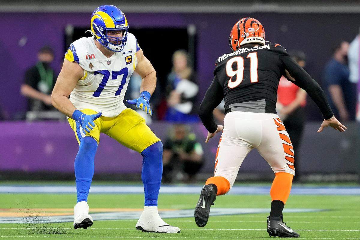 Los Angeles Rams offensive tackle Andrew Whitworth (77) blocks against Cincinnati Bengals defensive end Trey Hendrickson (91) in the second quarter during Super Bowl 56, Sunday, Feb. 13, 2022, at SoFi Stadium in Inglewood, Calif.