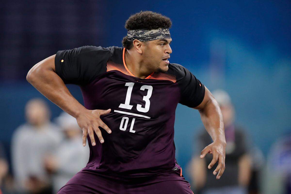 Washington State offensive lineman Andre Dillard could be in play for the Panthers at No. 16. (AP Photo/Michael Conroy)