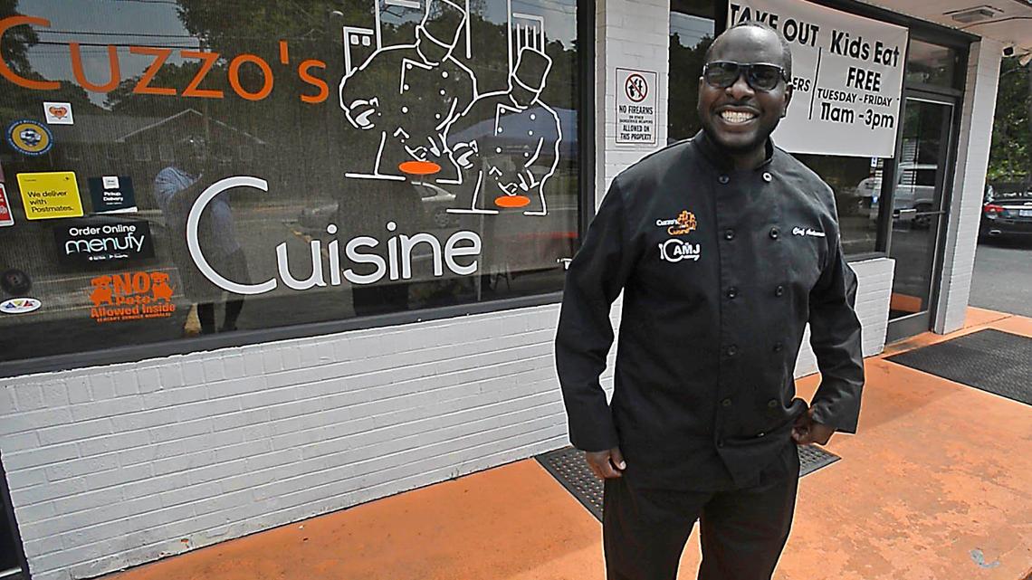 Chef Andarrio Johnson of Cuzzo’s Cuisine at the Enderly Park location. Soon, a University City location of the restaurant he co-owns with cousin Anglee Brown will open, too.