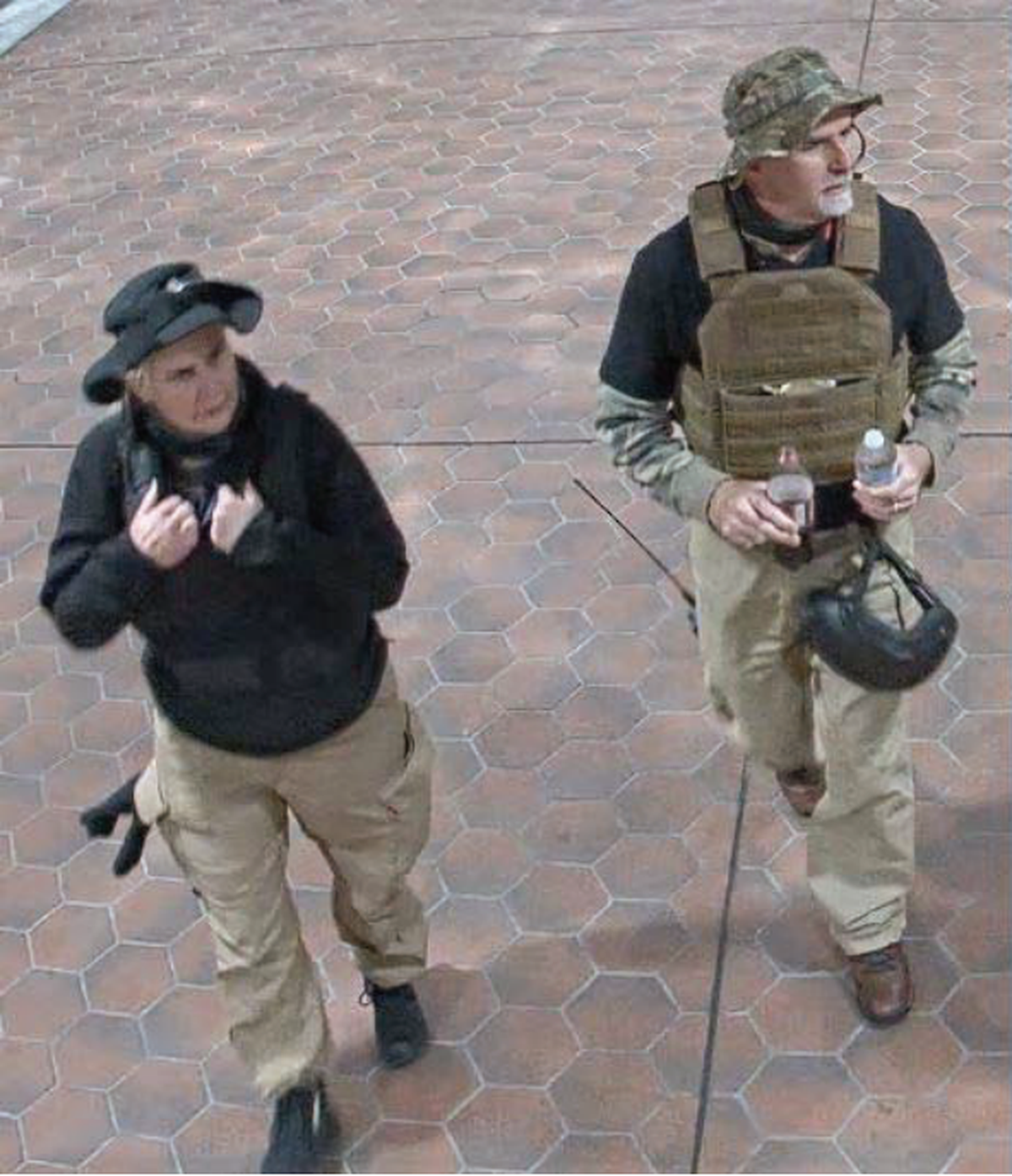 Law enforcement identified former High Point police officer Laura Steele, left, and brother Graydon Young in this image taken Jan. 6, 2021, from a Washington Metro Area Transit Authority surveillance video, according to a federal affidavit.