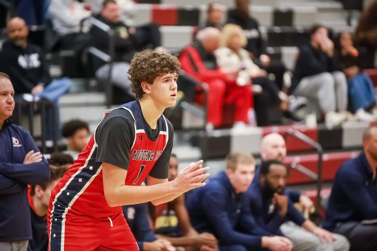 Providence Day Zeke Battier battles for position, working to free himself for the incoming pass at the Charlotte Hoops Challenge on Nov. 29, 2025, at Harding High School.