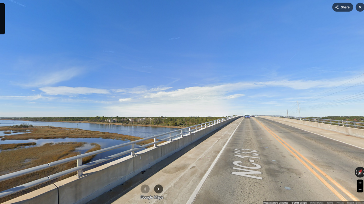 The incident happened July 4 on the G.V. Barbee Bridge to Oak Island, NC, and the driver is accused of being impaired, the Oak Island Police Department said in a news release.