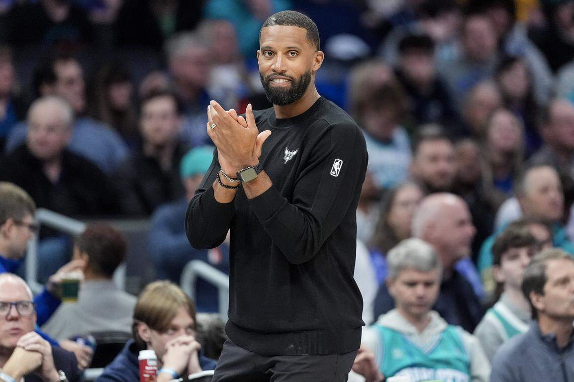 Charlotte Hornets head coach Charles Lee reacts during the first half of an NBA basketball game against the Dallas Mavericks, Tuesday, March 3, 2026, in Charlotte, N.C. 